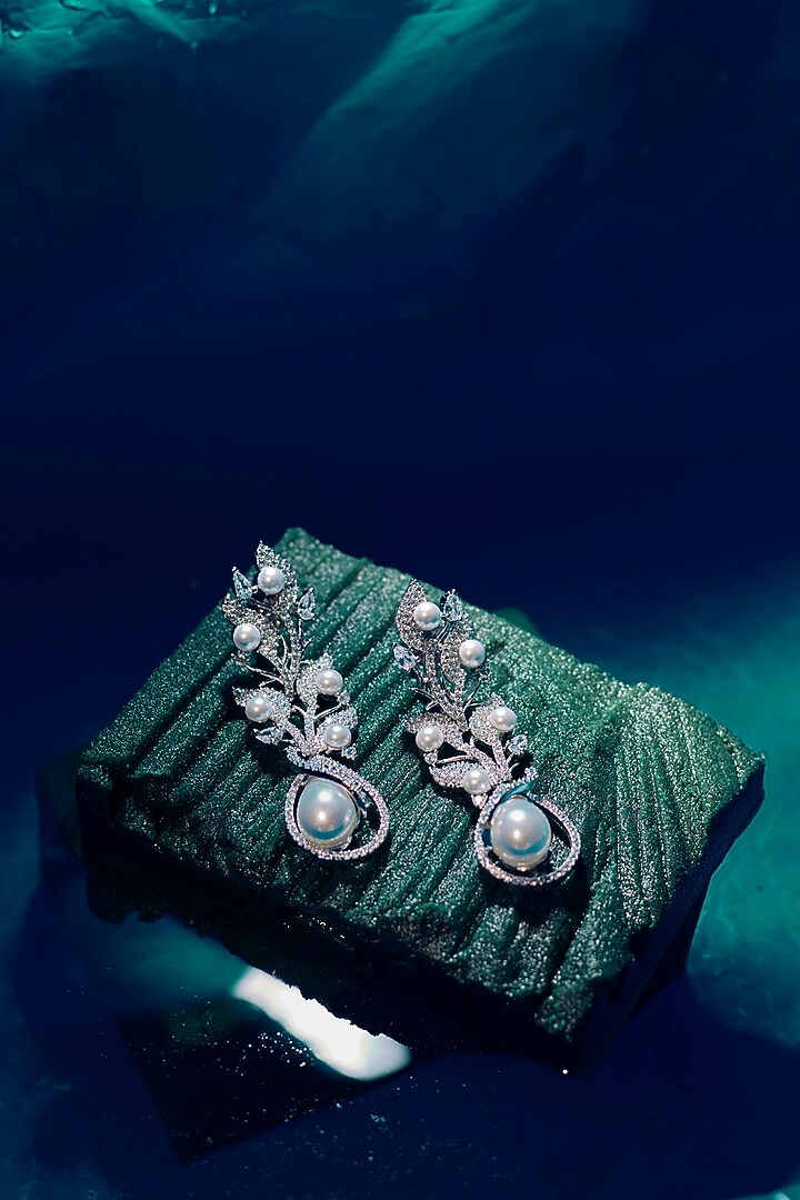 White Finish Zircon Dangler Earrings by Aster at Pernia's Pop Up Shop