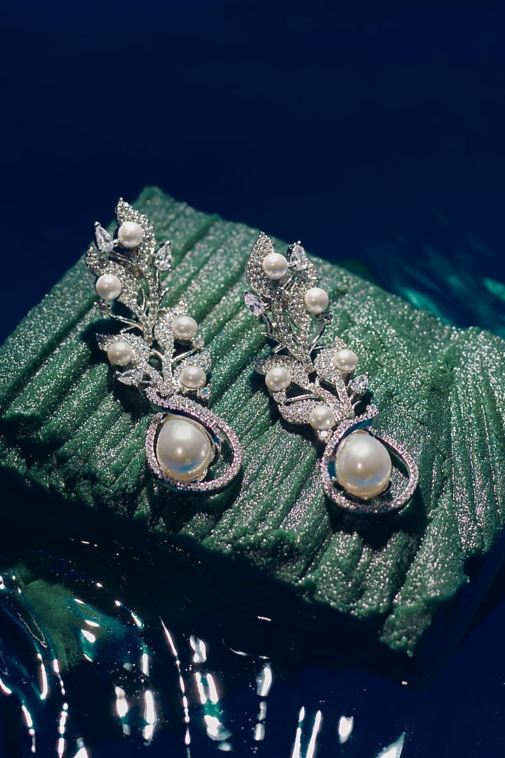 White Finish Zircon Dangler Earrings by Aster at Pernia's Pop Up Shop