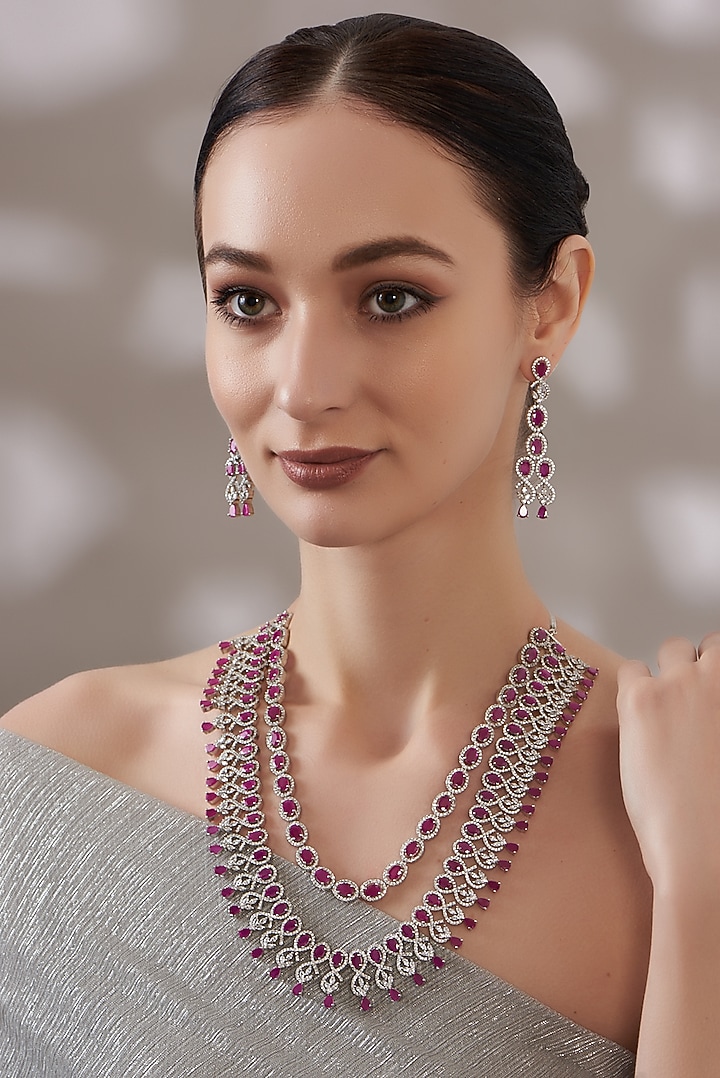 White Finish Zircon & Red Stone Dangler Earrings by Aster at Pernia's Pop Up Shop