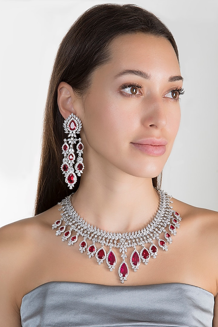 White Finish Zircon & Red Stone Dangler Earrings by Aster at Pernia's Pop Up Shop