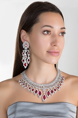 White Finish Zircon & Red Stone Dangler Earrings by Aster