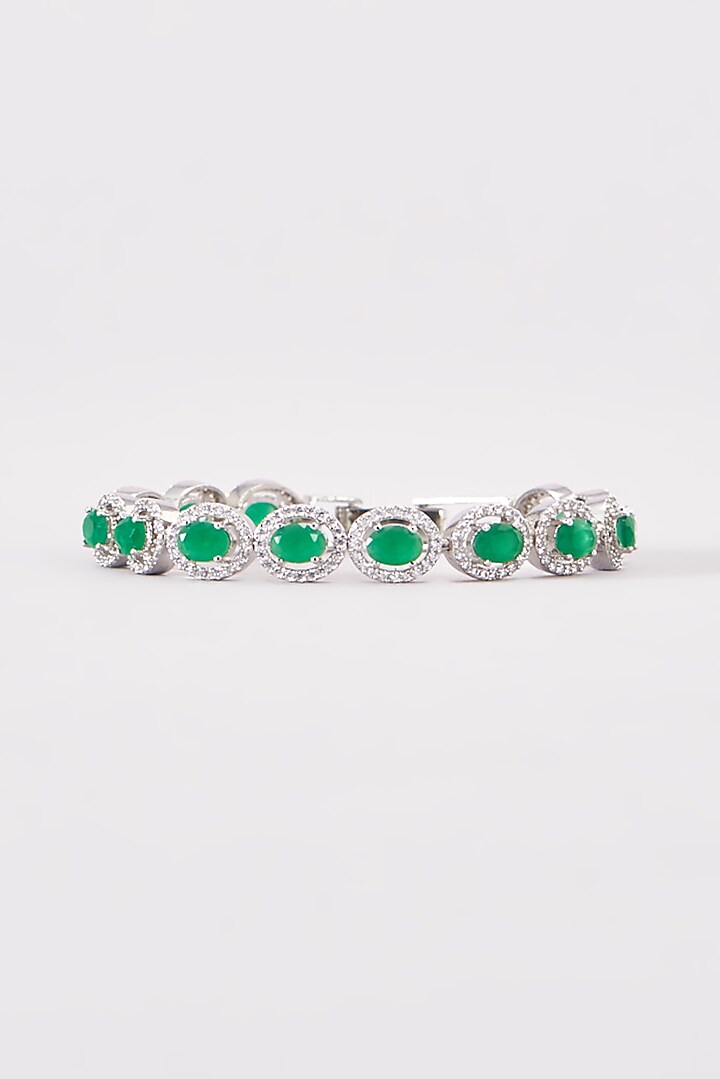 White Finish Zircon & Synthetic Emerald Stone Bracelet by Aster at Pernia's Pop Up Shop
