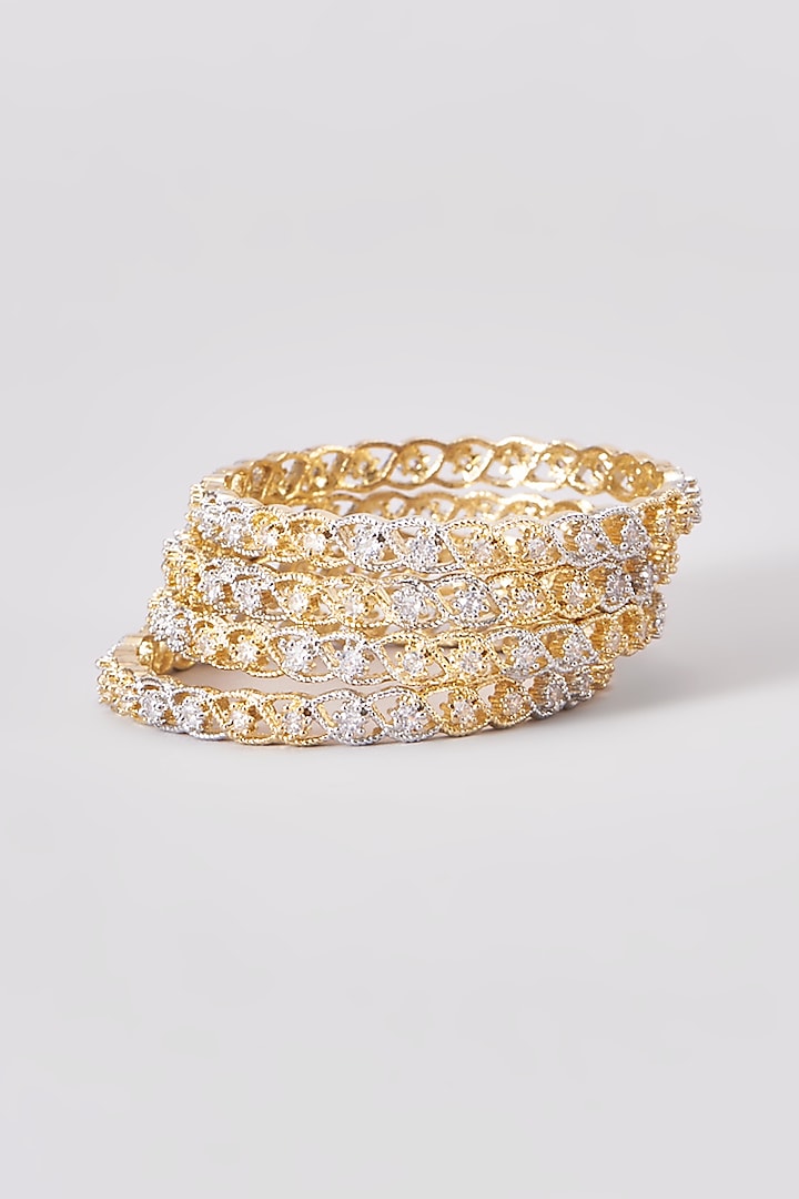 Gold Finish Zircon Bangles (Set of 4) by Aster at Pernia's Pop Up Shop
