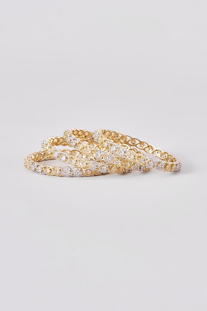 Gold Finish Zircon Bangles (Set of 4) by Aster at Pernia's Pop Up Shop