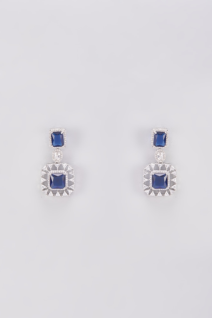 White Finish Zircon & Blue Stone Dangler Earrings by Aster at Pernia's Pop Up Shop