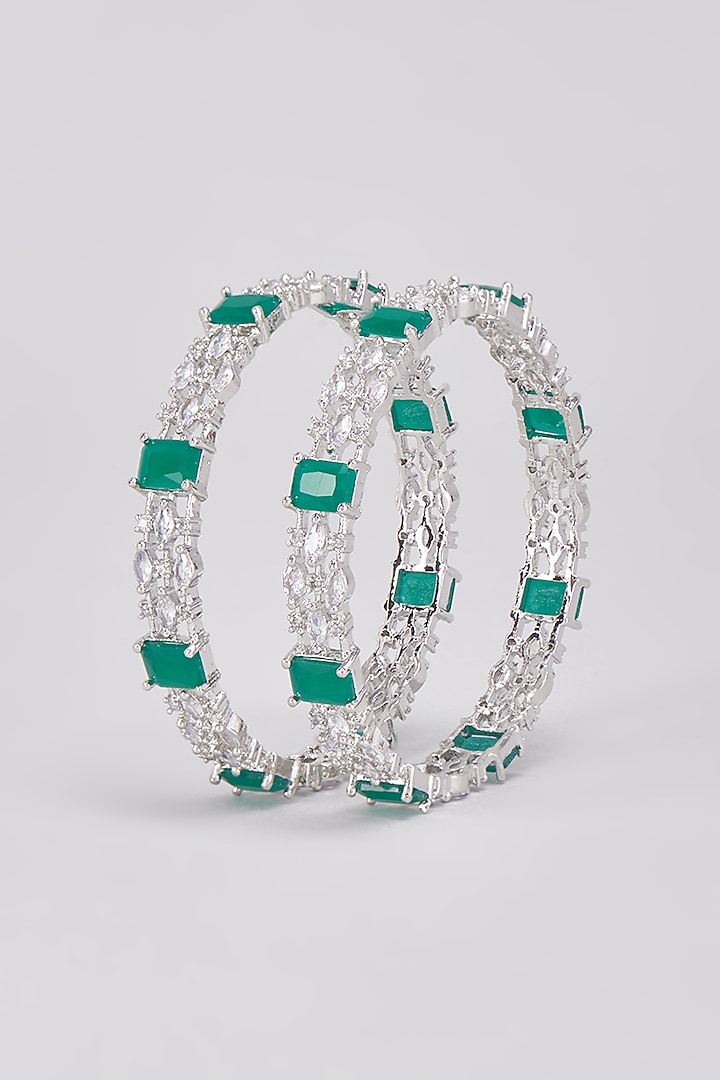White Finish Zircons & Green Stone Bangles (Set Of 2) by Aster at Pernia's Pop Up Shop