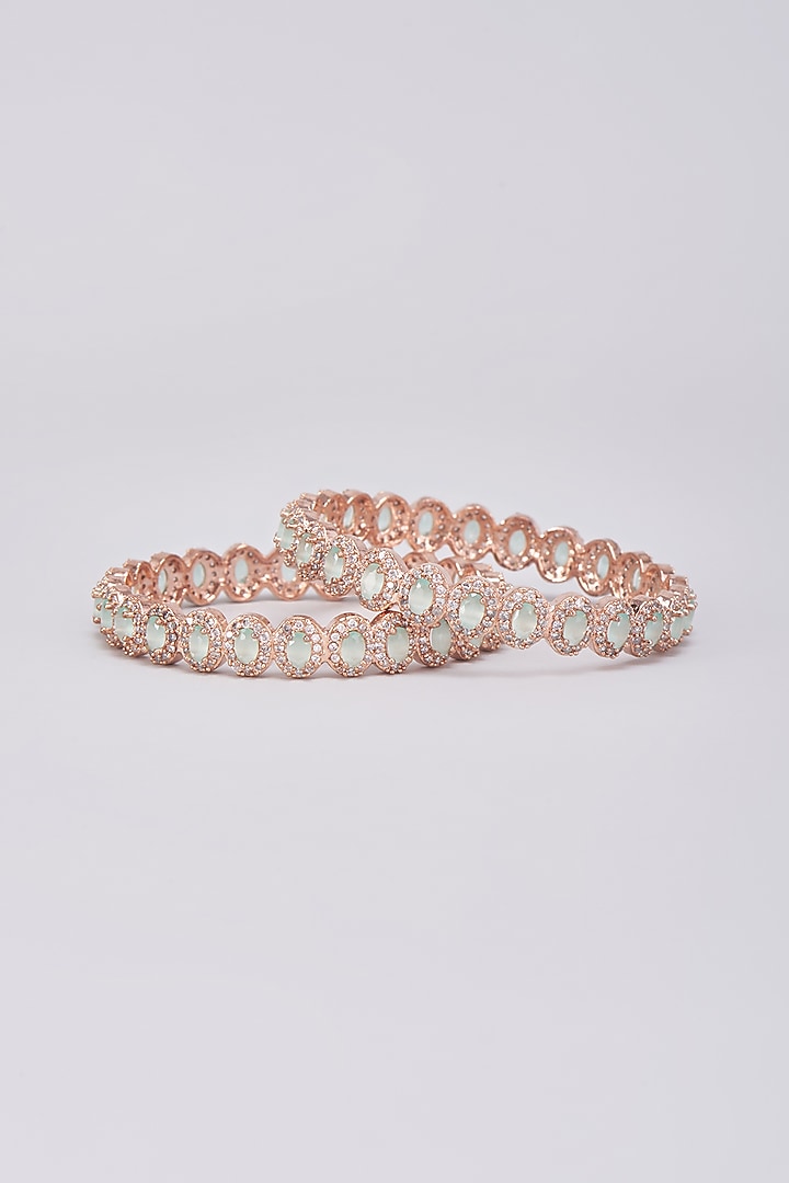 Rose Gold Finish Zircon & Aqua Green Stone Bangles (Set of 2) by Aster at Pernia's Pop Up Shop