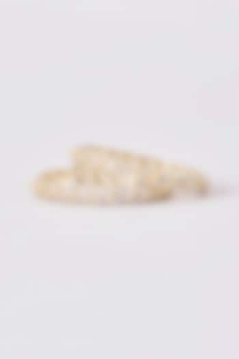Gold Finish Zircon Bangles (Set of 2) by Aster at Pernia's Pop Up Shop