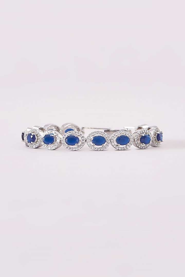 White Finish Zircon & Blue Stone Bracelet by Aster at Pernia's Pop Up Shop