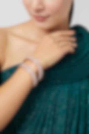 Rose Gold Finish Zircon Bangles (Set of 2) by Aster at Pernia's Pop Up Shop