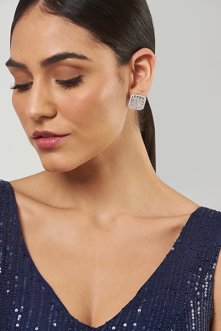 White Finish Zircon Stud Earrings by Aster at Pernia's Pop Up Shop