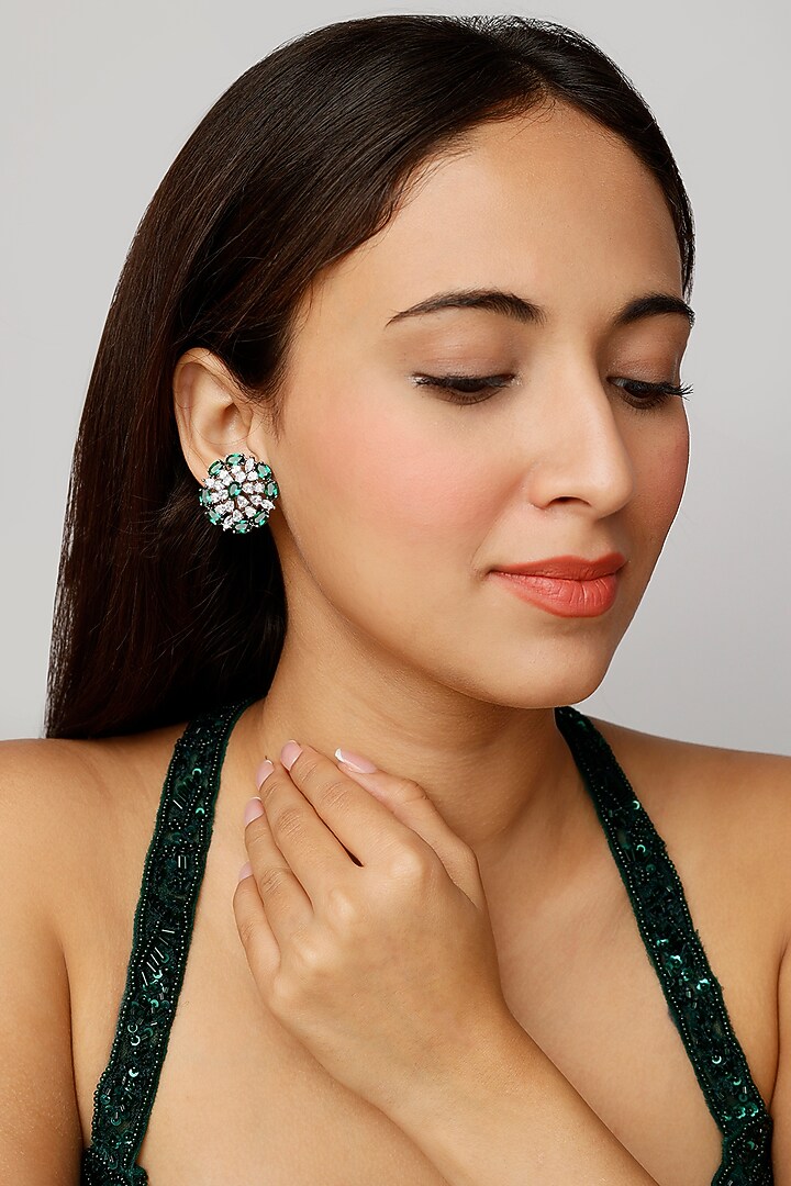 White Finish Zircon & Emerald Synthetic Stone Stud Earrings by Aster at Pernia's Pop Up Shop