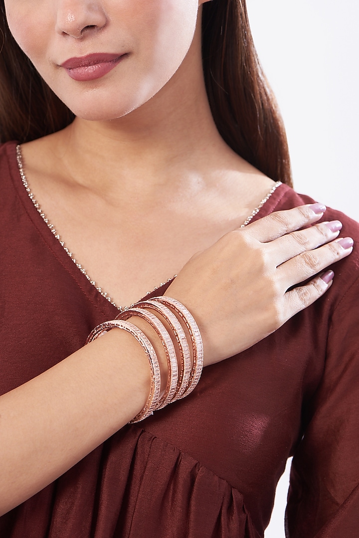 Rose Gold Finish Zircons Bangles (Set Of 4) by Aster at Pernia's Pop Up Shop