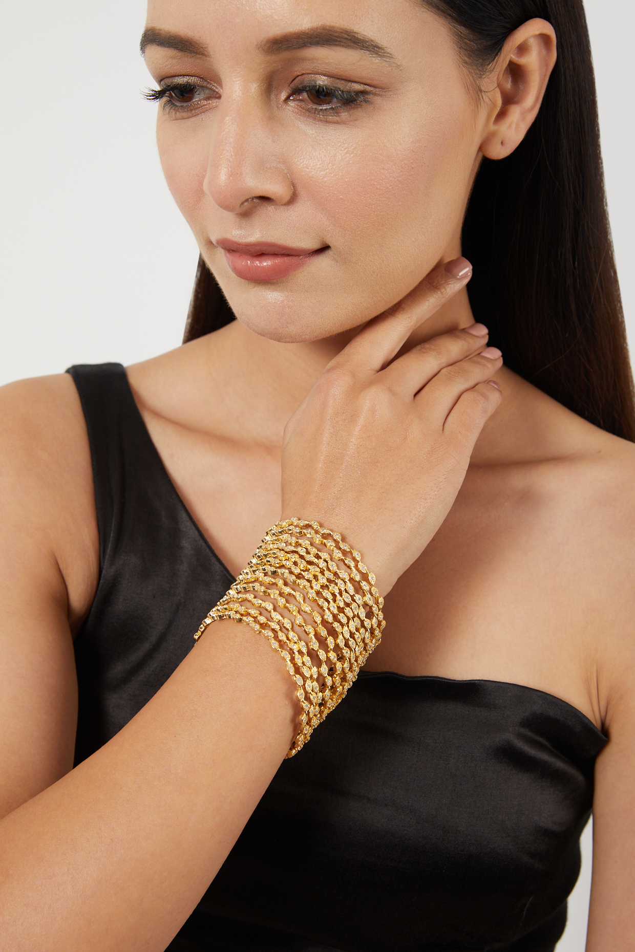 Gold Finish Bangles With Zircons (Set of 12) by Aster at Pernia's Pop Up Shop