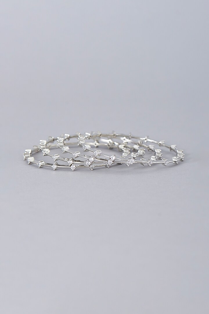 White Finish Zircon Bangles (Set of 4) by Aster at Pernia's Pop Up Shop