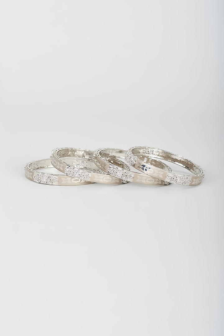 White Finish Zircon Bangles (Set of 4) by Aster at Pernia's Pop Up Shop