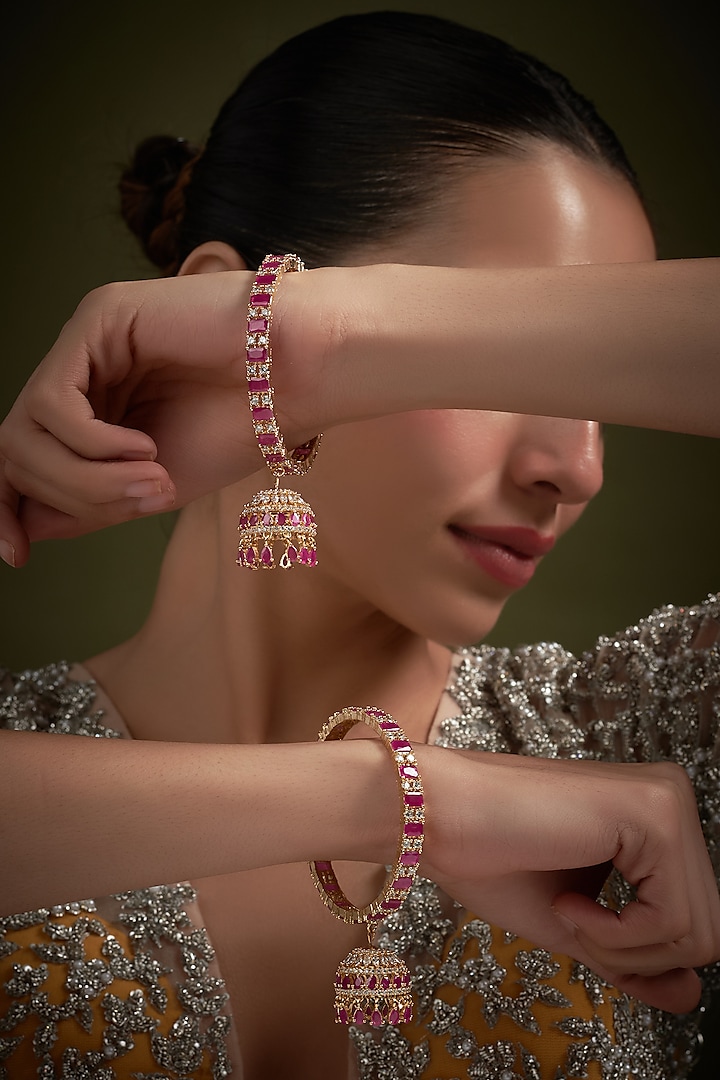 Gold Finish Red Stone & Zircon Bangles (Set of 2) by Aster at Pernia's Pop Up Shop
