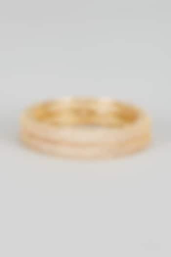Gold Finish Zircon Bangles (Set of 2) by Aster at Pernia's Pop Up Shop