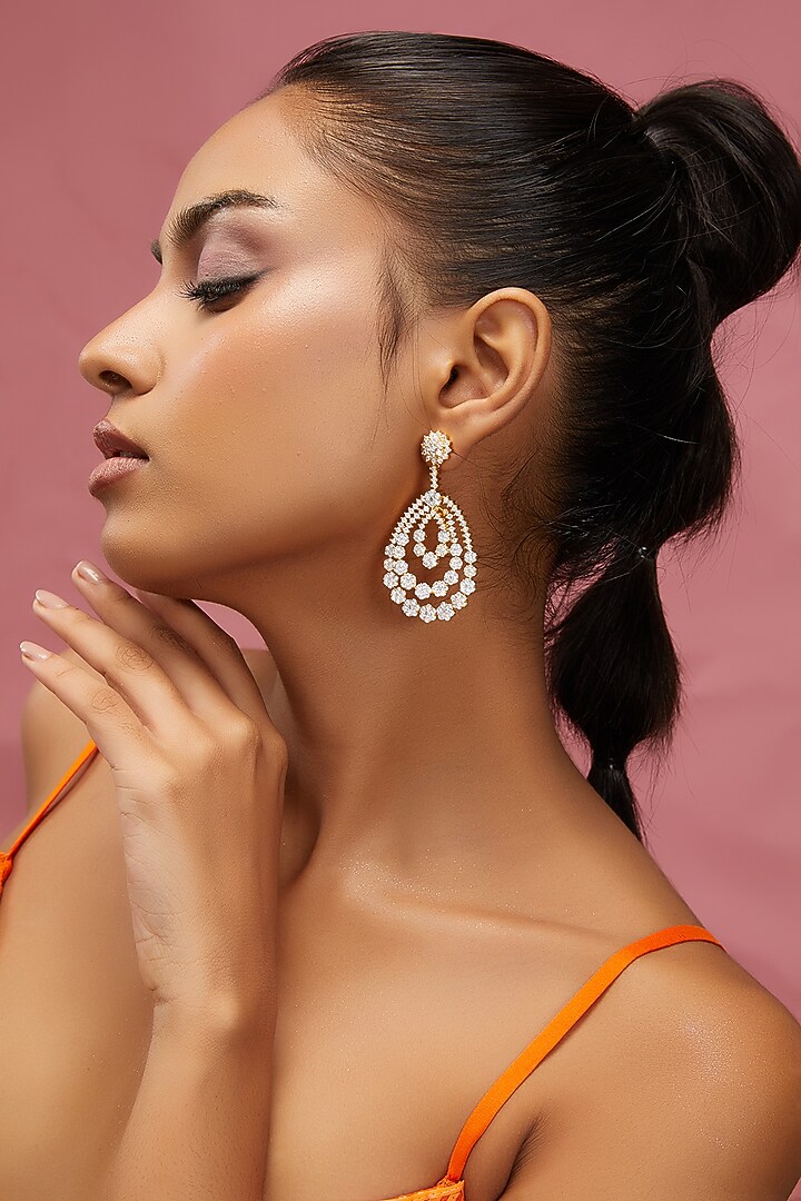 Gold Finish Zircon Dangler Earrings by Aster at Pernia's Pop Up Shop