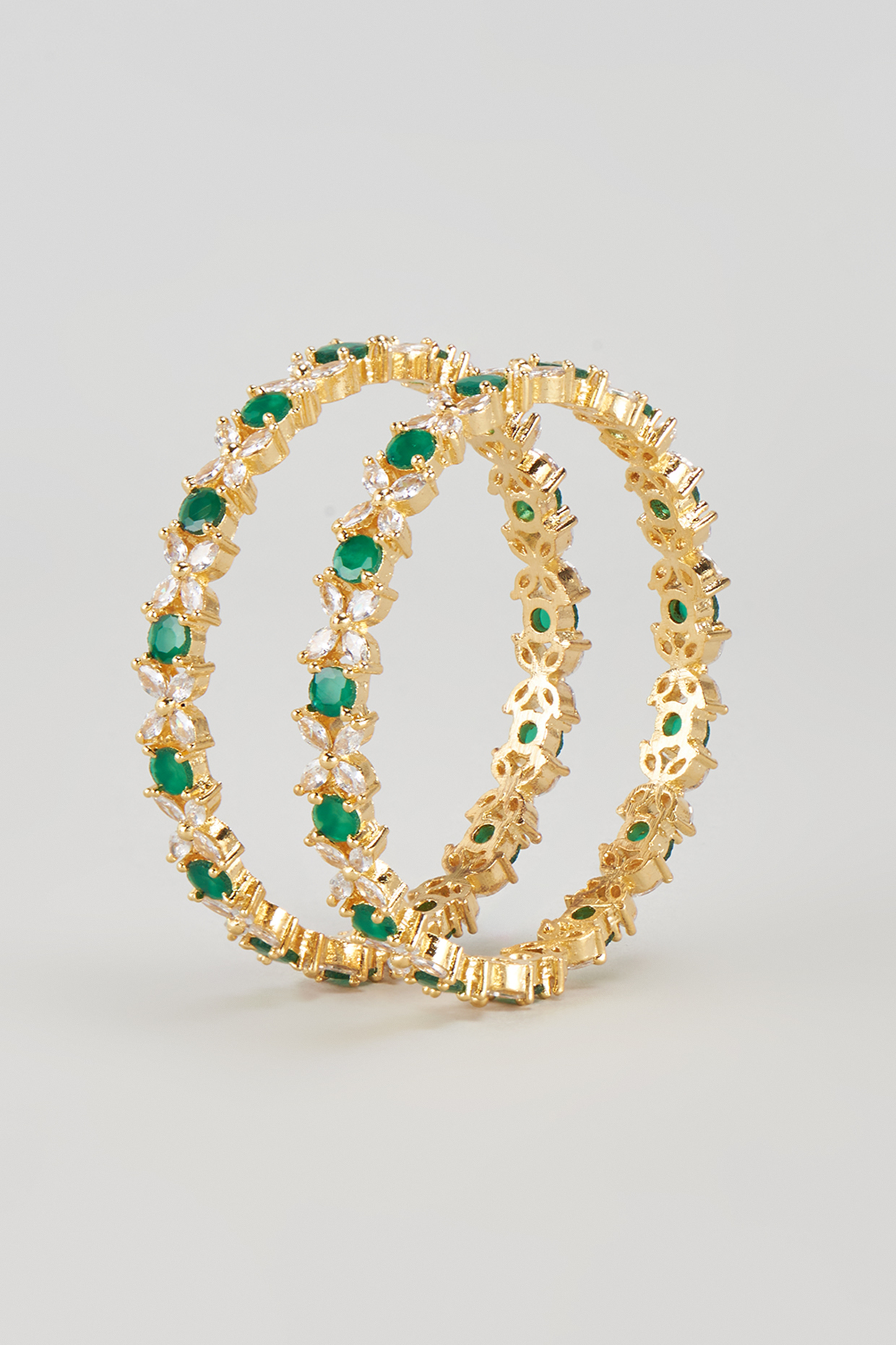Gold Finish Zircon & Green Stone Bangles (Set of 2) by Aster at Pernia's Pop Up Shop