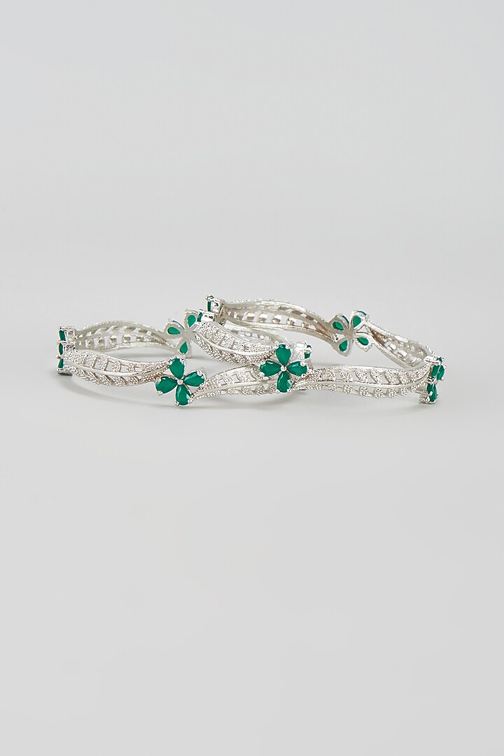 White Finish Zircon & Green Stone Bangles (Set of 2) by Aster at Pernia's Pop Up Shop