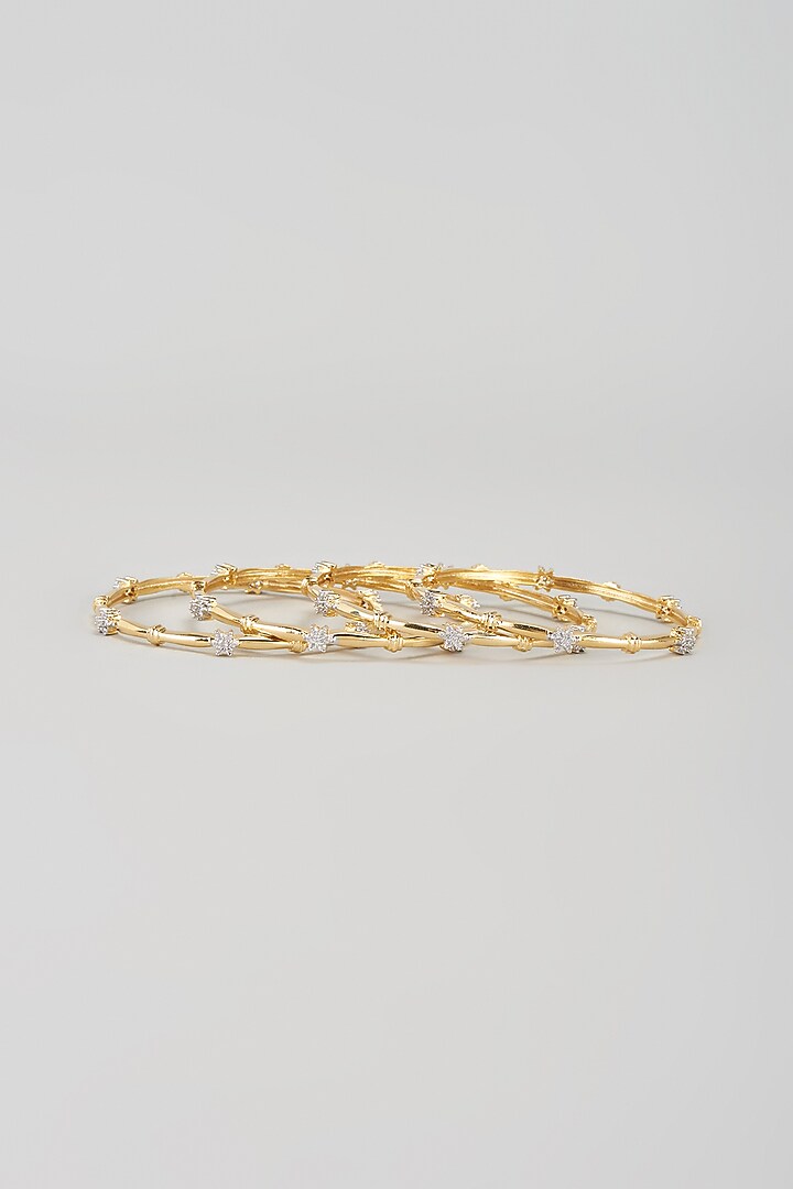 Gold Finish Zircon Bangles (Set of 4) by Aster at Pernia's Pop Up Shop