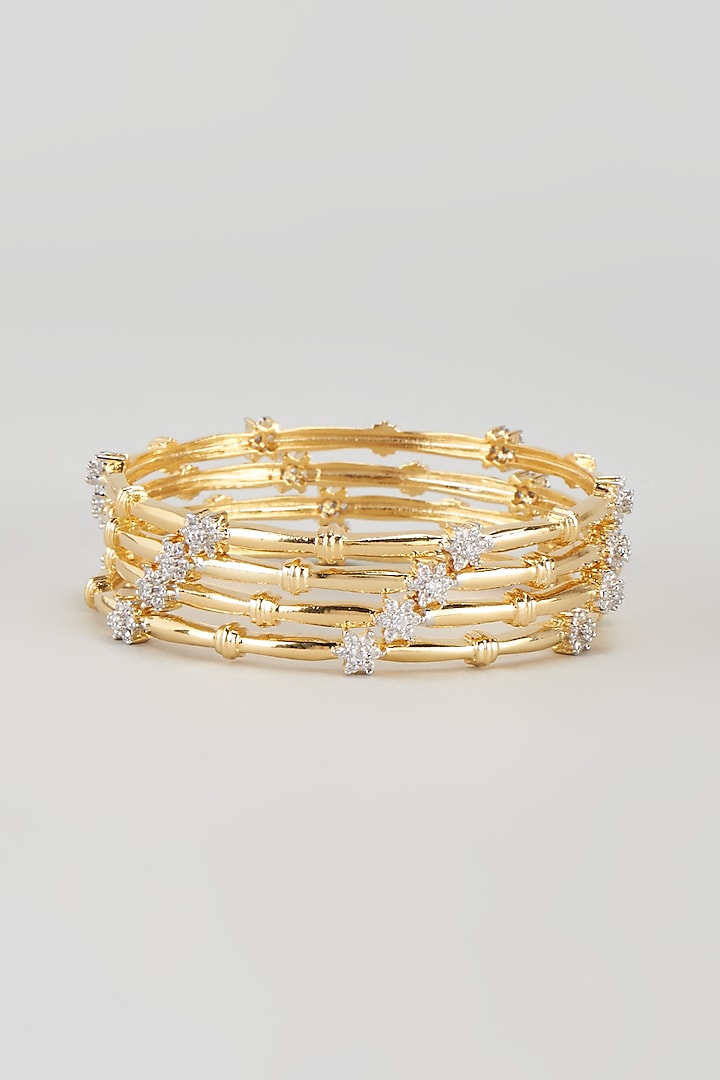 Gold Finish Zircon Bangles (Set of 4) by Aster at Pernia's Pop Up Shop