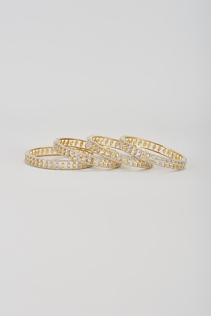 Gold Finish Zircon Bangles (Set of 4) by Aster at Pernia's Pop Up Shop