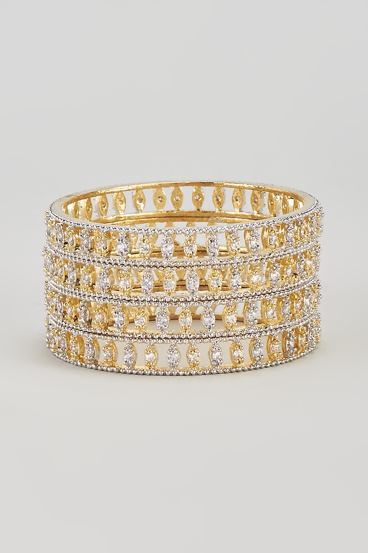 Gold Finish Zircon Bangles (Set of 4) by Aster at Pernia's Pop Up Shop