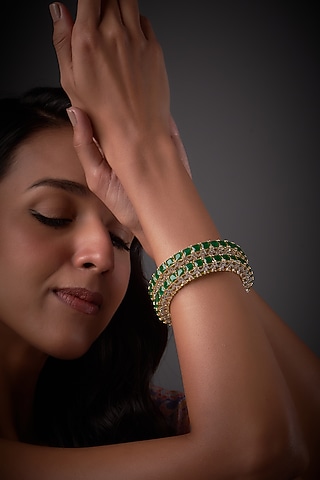 Gold Finish Zircon & Green Stone Bangles (Set of 2) by Aster