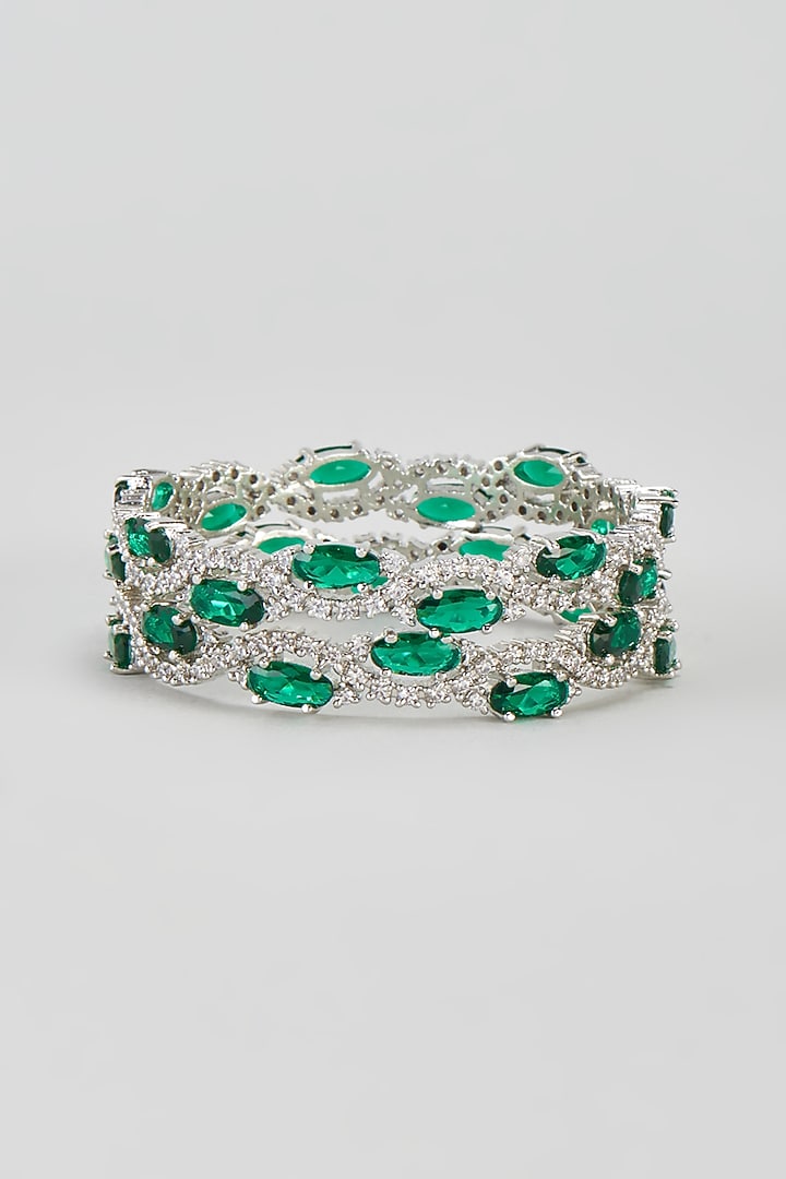 White Finish Zircon & Green Stone Bangles (Set of 2) by Aster at Pernia's Pop Up Shop