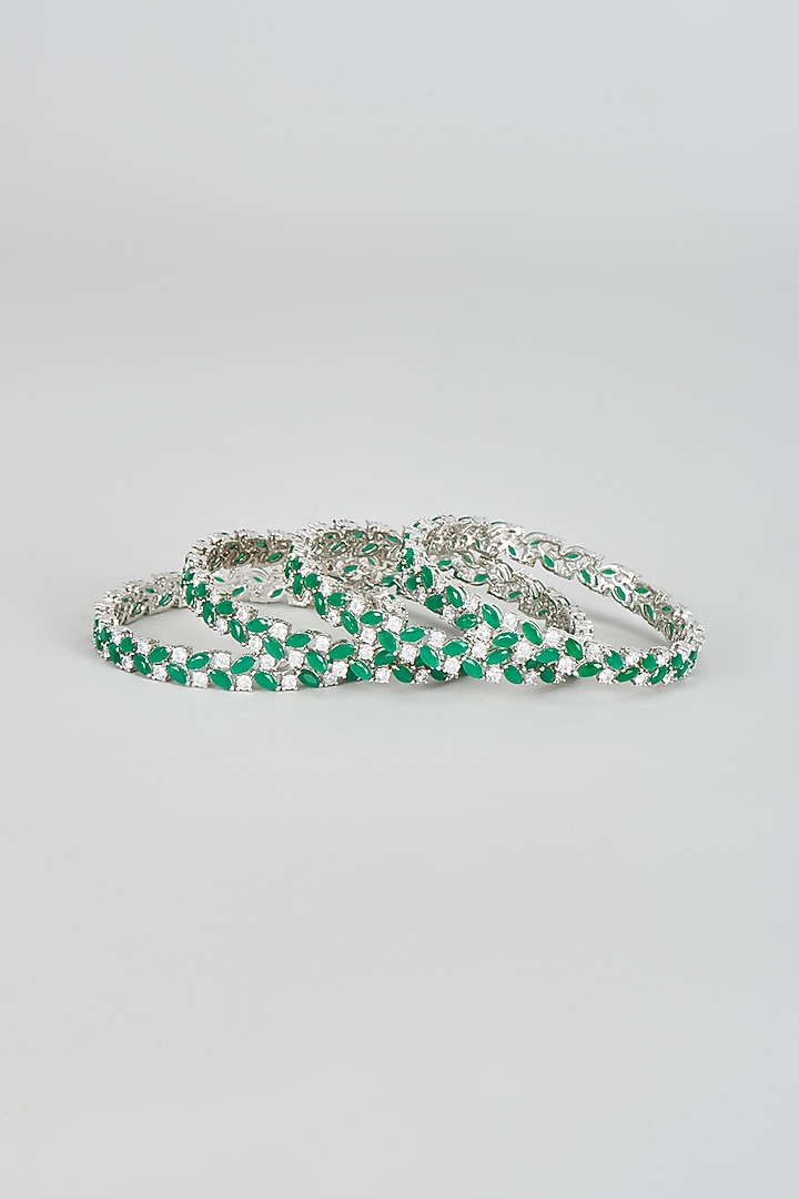 White Finish Zircon & Green Stone Bangles (Set of 4) by Aster at Pernia's Pop Up Shop