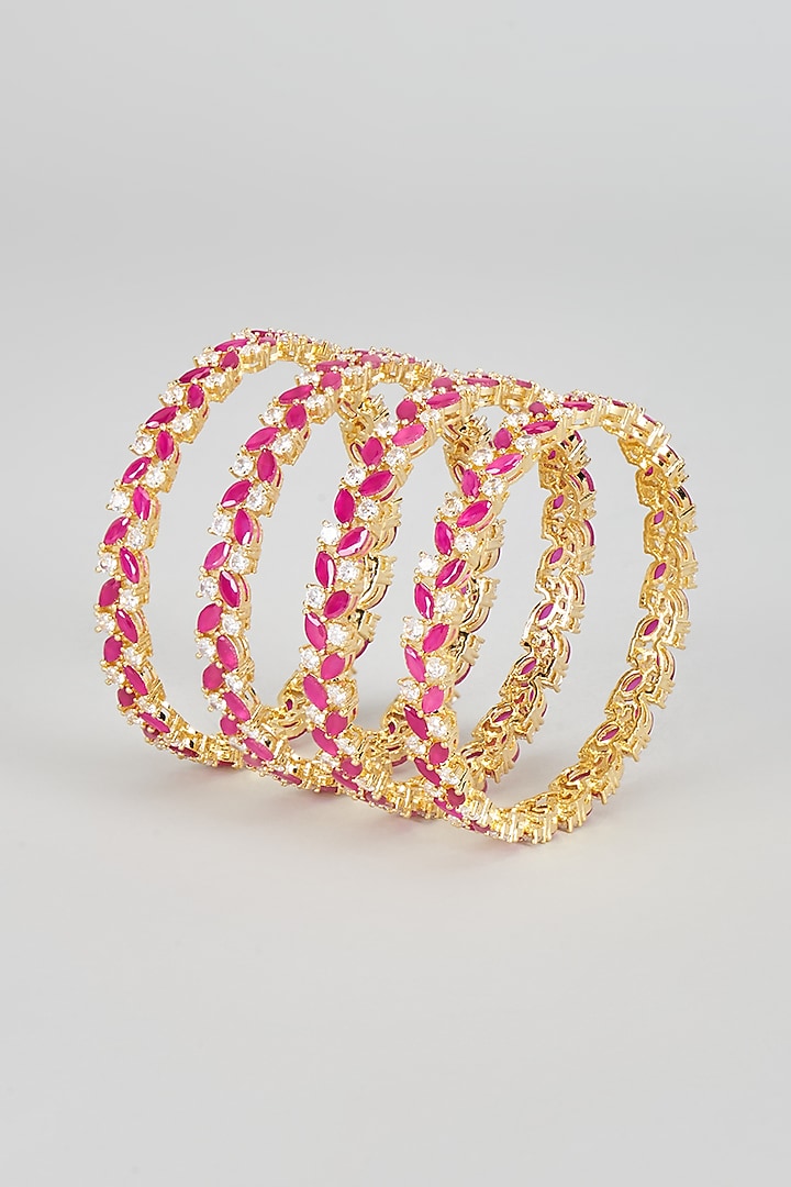 Gold Finish Zircon & Red Stone Bangles (Set of 4) by Aster at Pernia's Pop Up Shop