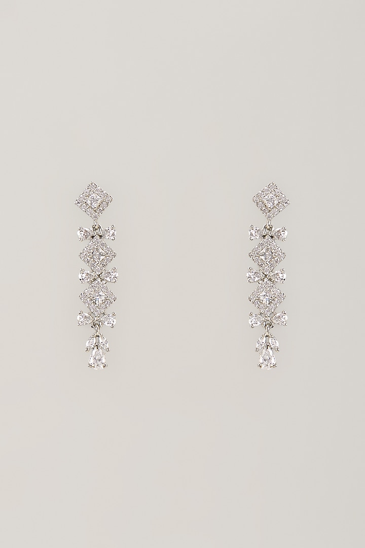 White Finish Synthetic Stone Dangler Earrings by Aster at Pernia's Pop Up Shop