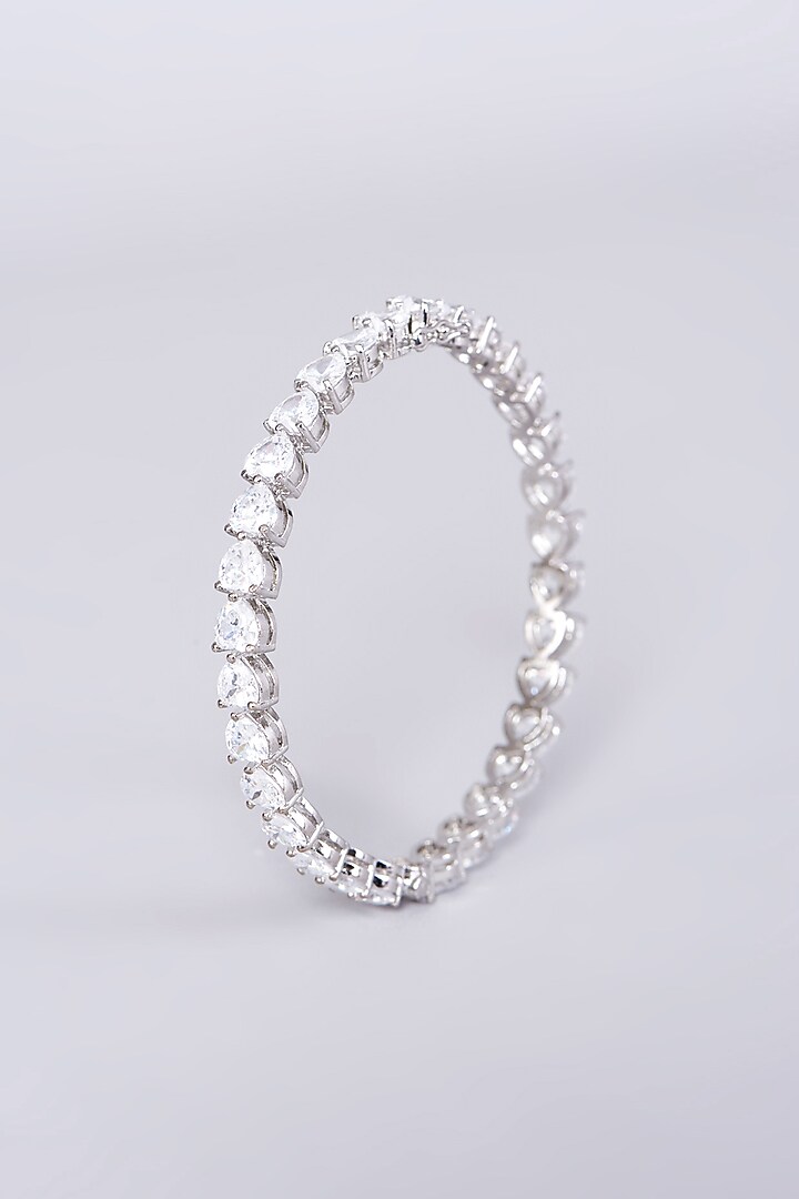 White Finish Bangles In Mixed Metal (Set Of 2) by Aster at Pernia's Pop Up Shop