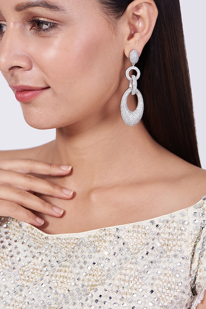 White Finish Faux Diamond Dangler Earrings by Aster at Pernia's Pop Up Shop