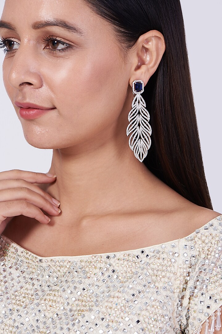 White Finish Faux Diamond Leaf Earrings by Aster at Pernia's Pop Up Shop