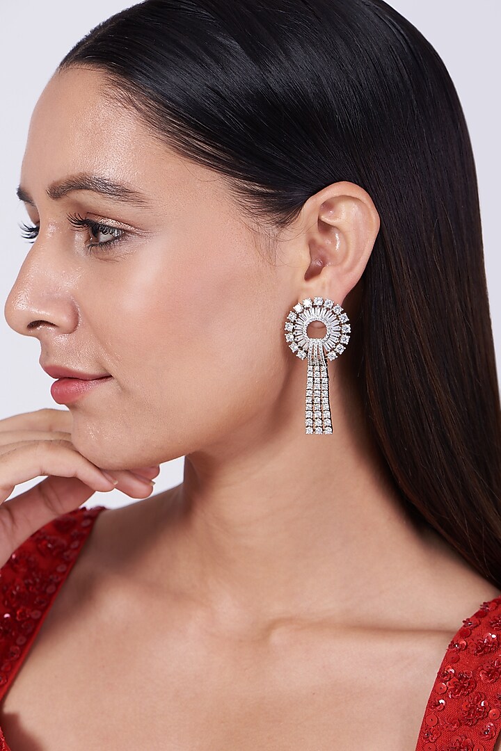 White Finish Zircons & Faux Diamonds Dangler Earrings by Aster at Pernia's Pop Up Shop