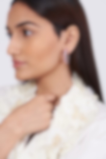 White Finish Synthetic Stone Earrings by Aster at Pernia's Pop Up Shop