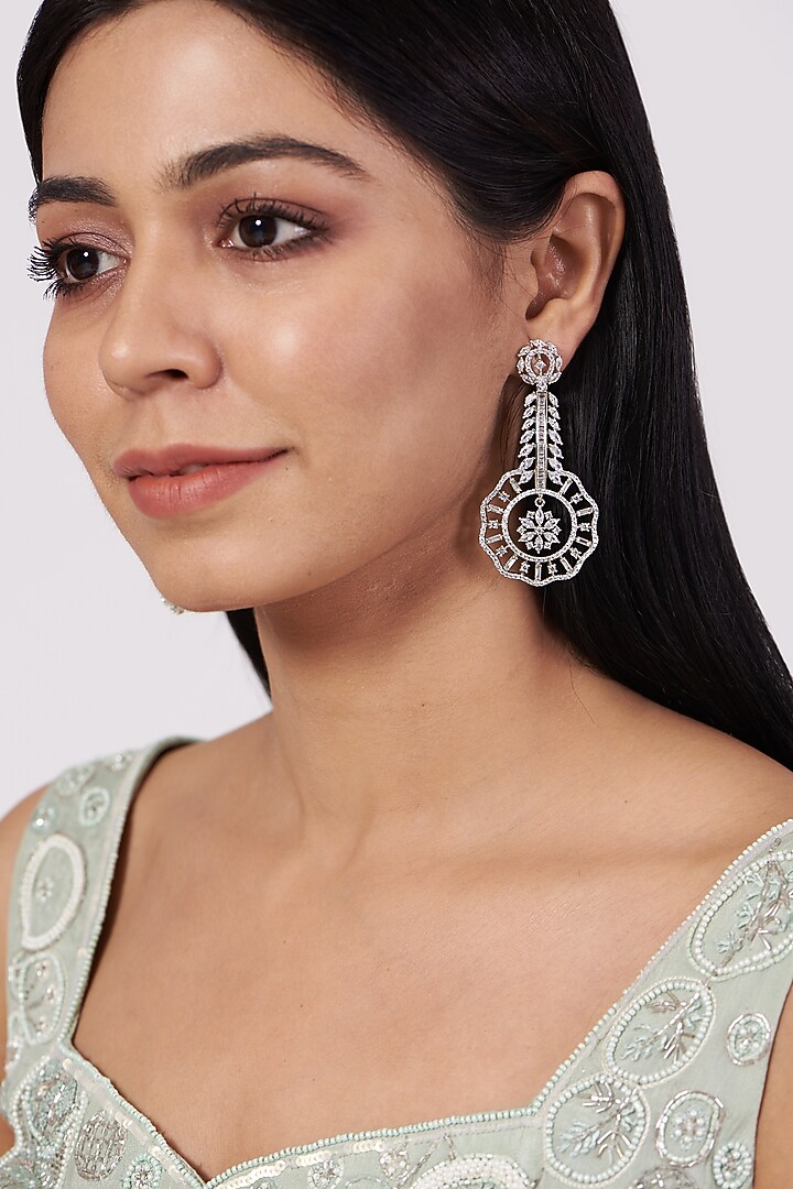 White Finish Faux Diamonds Dangler Earrings by Aster at Pernia's Pop Up Shop