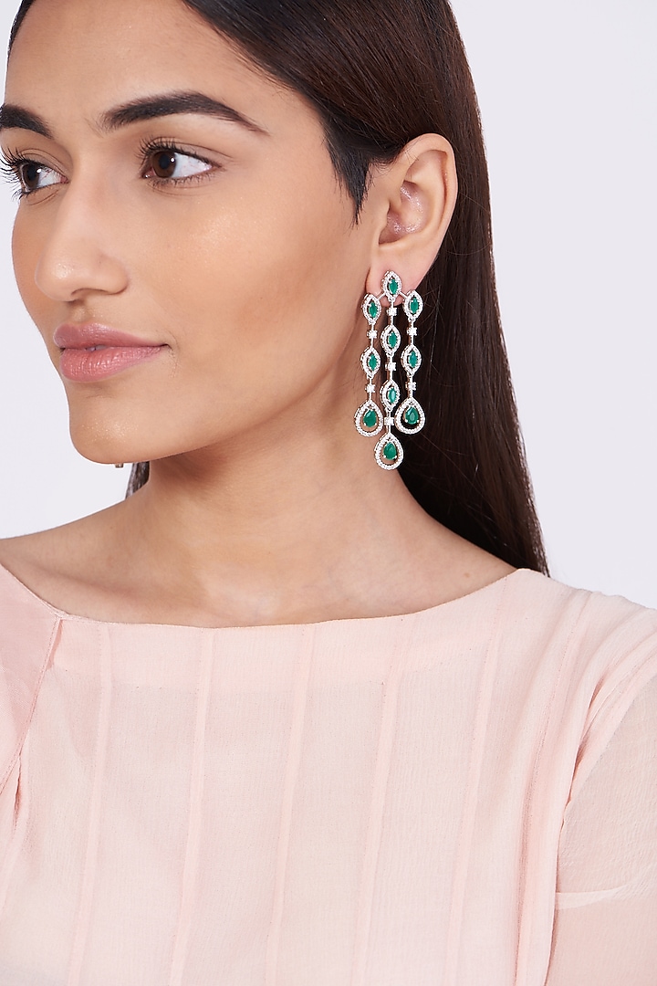White Finish Dangler Earrings With Faux Diamonds & Zircons by Aster at Pernia's Pop Up Shop