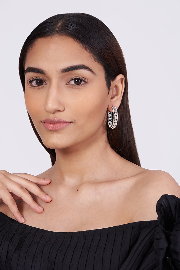 White Finish Hoop Earrings With Faux Diamonds by Aster at Pernia's Pop Up Shop