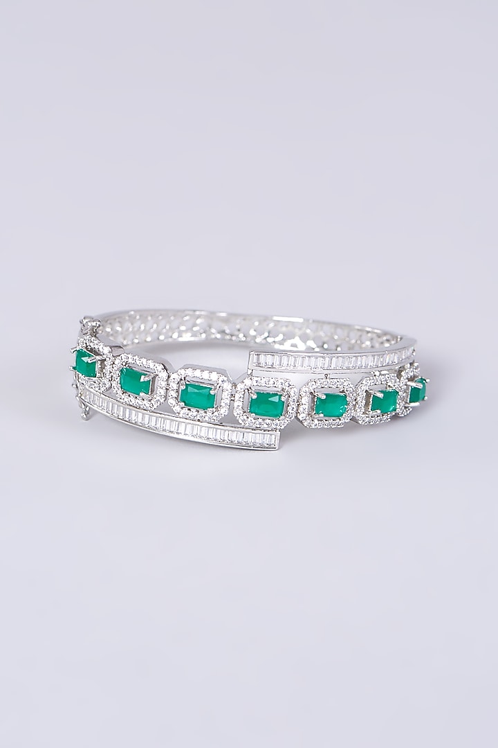 White Finish Bangle With Green Synthetic Stones by Aster at Pernia's Pop Up Shop