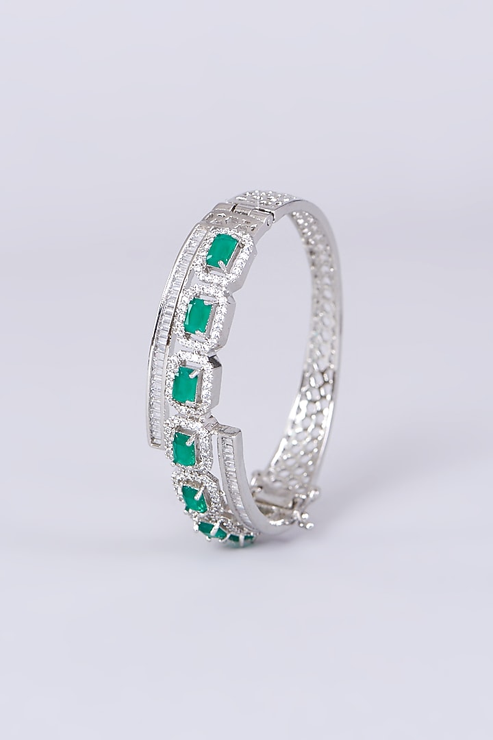 White Finish Bangle With Green Synthetic Stones by Aster at Pernia's Pop Up Shop