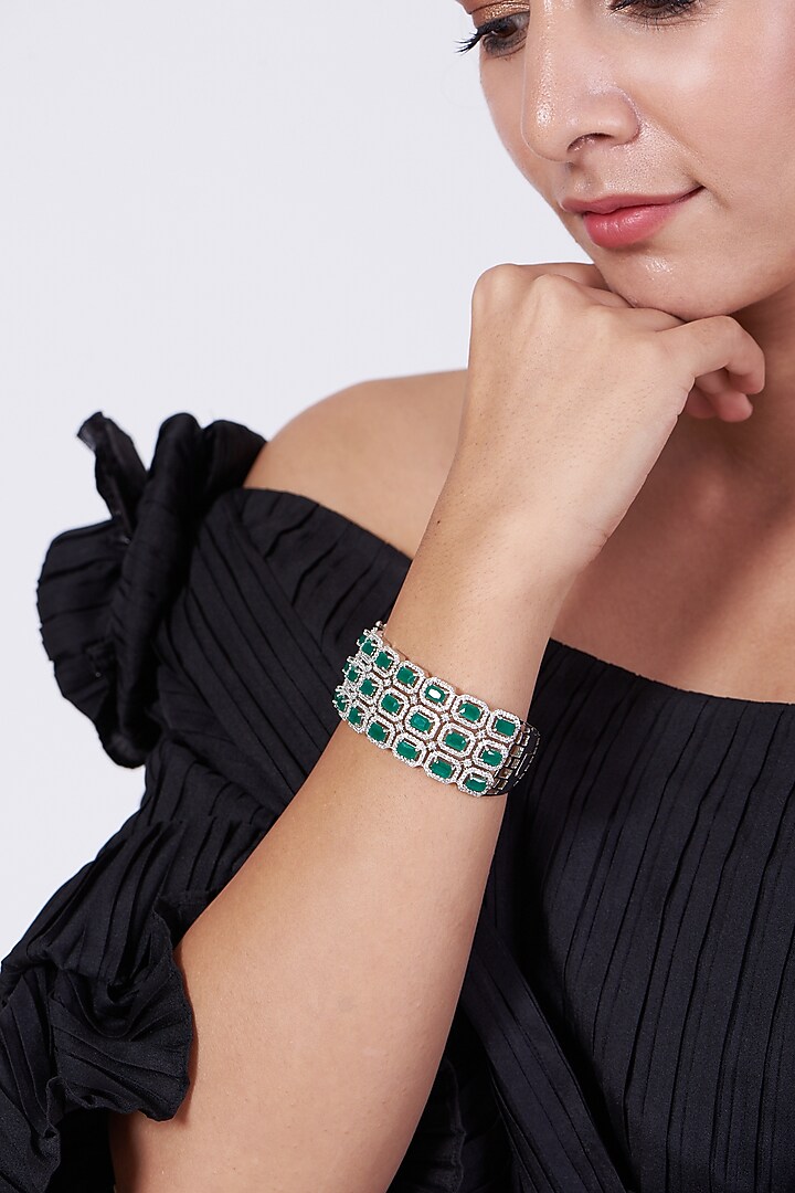 White Finish Faux Diamonds Bangle by Aster at Pernia's Pop Up Shop