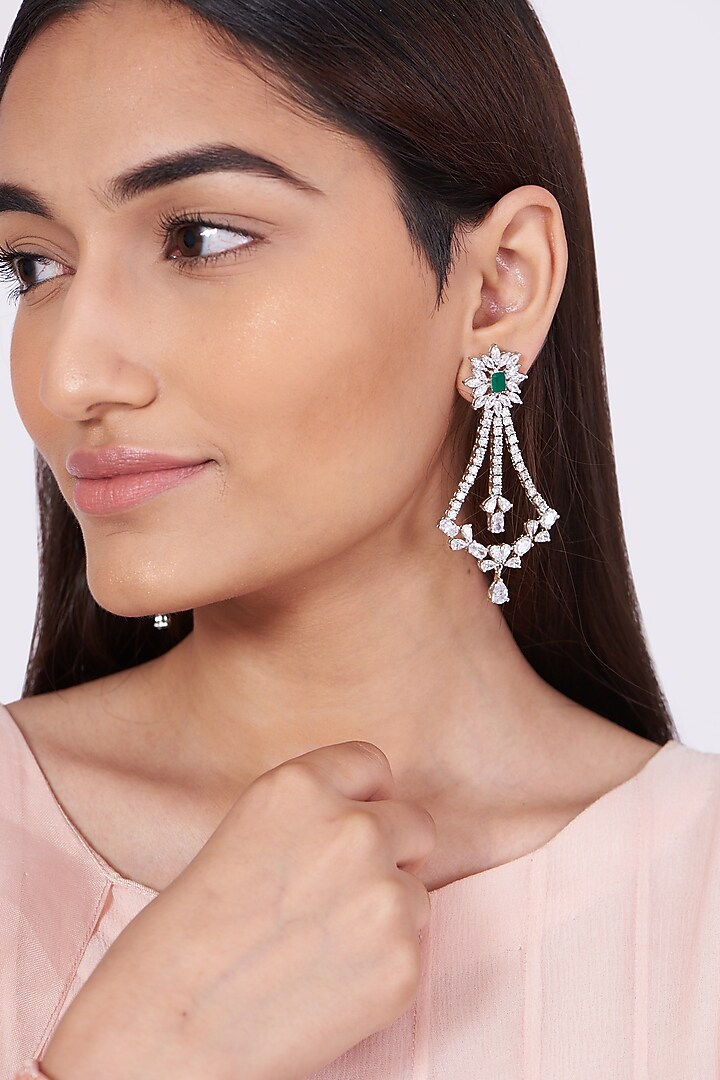 White Finish Dangler Earrings Studded With Green Stones by Aster at Pernia's Pop Up Shop