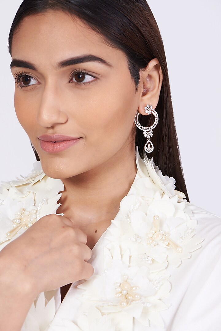 Rose Gold Finish Stud Earrings With Faux Diamonds by Aster at Pernia's Pop Up Shop