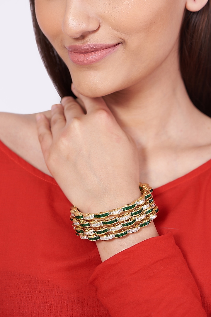 Gold Finish Faux Diamonds Bangles (Set of 4) by Aster at Pernia's Pop Up Shop