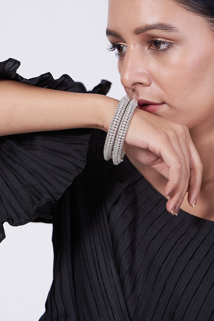 White Finish Faux Diamonds Bangles by Aster at Pernia's Pop Up Shop