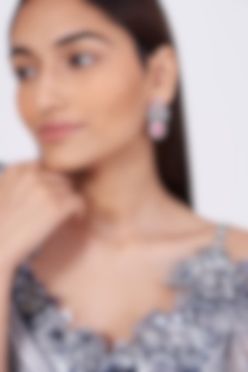 White Finish Earrings With Synthetic Stone by Aster at Pernia's Pop Up Shop